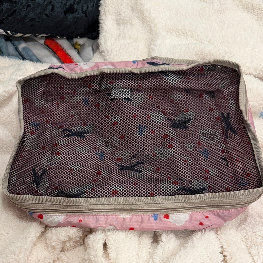 LeSportsac Pink and Gray medium packing cube with Airplane Print
